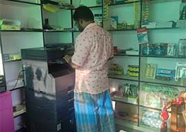 Tamaraiselvan at his shop at Dharmapuri